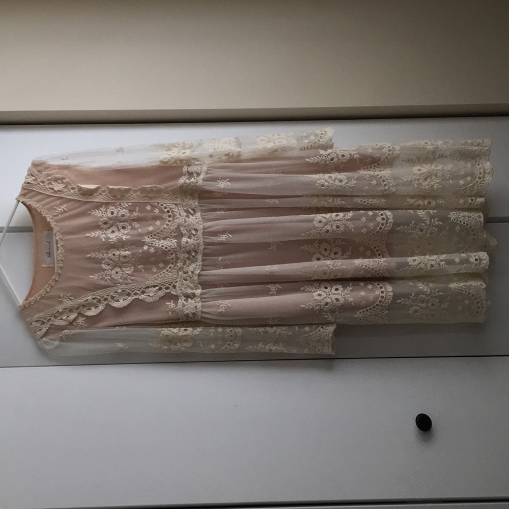 Beautiful cream colored dress with nude lining